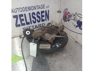 Usados Suspensión de ruedas izquierda detrás BMW 1 serie (E87/87N) 118i 16V Precio € 57,75 Norma de margen ofrecido por Zelissen V.O.F. autodemontage
