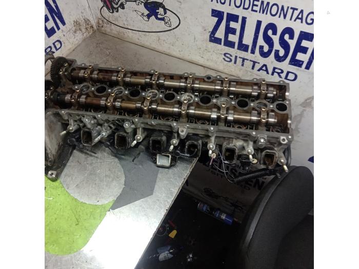 Usagé Culasse BMW 7 serie (E65/E66/E67) 730d 24V Prix € 498,75 Règlement à la marge proposé par Zelissen V.O.F. autodemontage