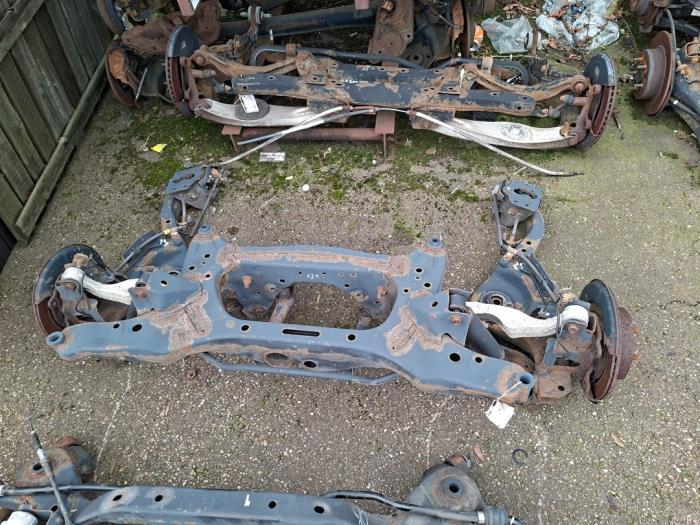 Gebrauchte Hinterachse Vorderradantrieb Nissan Qashqai (J10) 2.0 16V Preis € 236,25 Margenregelung angeboten von Zelissen V.O.F. autodemontage