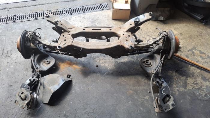 Gebrauchte Hinterachse Vorderradantrieb Nissan Qashqai (J10) 2.0 16V Preis € 262,50 Margenregelung angeboten von Zelissen V.O.F. autodemontage