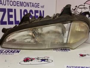 Gebrauchte Scheinwerfer links Opel Tigra (75) 1.4i 16V Preis auf Anfrage angeboten von Zelissen V.O.F. autodemontage