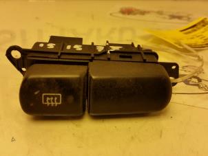 Used Rear window heating switch Mitsubishi Carisma 1.8 GDI 16V Price on request offered by Zelissen V.O.F. autodemontage
