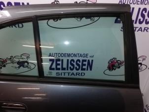 Used Rear door window 4-door door, rear right Nissan Almera (N16) 1.8 16V Price on request offered by Zelissen V.O.F. autodemontage