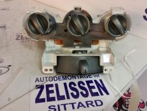 Usados Panel de control de calefacción Honda Jazz (GD/GE2/GE3) 1.3 i-Dsi Precio de solicitud ofrecido por Zelissen V.O.F. autodemontage