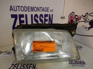 Używane Reflektor prawy Opel Kadett E (33/34/43/44) 1.6i Cena na żądanie oferowane przez Zelissen V.O.F. autodemontage