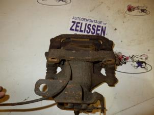 Used Rear brake calliper, left Fiat Doblo Cargo (223) 1.3 D 16V Multijet DPF Price € 63,00 Margin scheme offered by Zelissen V.O.F. autodemontage