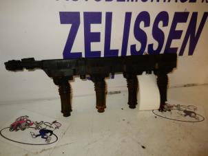 Used Ignition coil Opel Corsa B (73/78/79) 1.2i 16V Price on request offered by Zelissen V.O.F. autodemontage