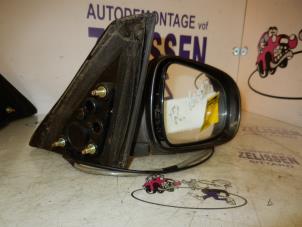 Used Wing mirror, right Daihatsu Sirion/Storia (M1) 1.0 12V Price on request offered by Zelissen V.O.F. autodemontage