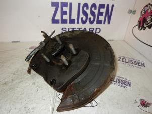 Used Rear suspension system, left Opel Astra H SW (L35) 1.3 CDTI 16V Ecotec Price on request offered by Zelissen V.O.F. autodemontage