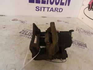 Used Front brake calliper, left Renault Twingo (C06) 1.2 16V Price € 31,50 Margin scheme offered by Zelissen V.O.F. autodemontage