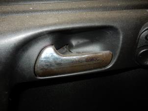Used Door handle 2-door, left Opel Astra G (F07) 2.2 16V Price on request offered by Zelissen V.O.F. autodemontage