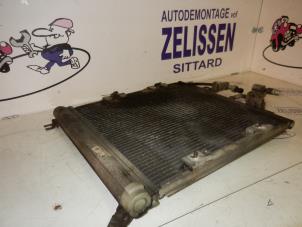Used Air conditioning condenser Opel Astra H SW (L35) 1.3 CDTI 16V Ecotec Price € 42,00 Margin scheme offered by Zelissen V.O.F. autodemontage
