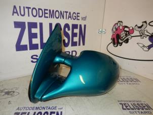 Used Wing mirror, left Opel Tigra (75) 1.4i 16V Price on request offered by Zelissen V.O.F. autodemontage