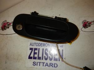 Used Front door handle 4-door, right Mitsubishi Space Star (DG) 1.3 16V Price on request offered by Zelissen V.O.F. autodemontage