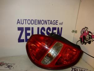 Used Taillight, left Daihatsu Sirion/Storia (M1) 1.0 12V DVVT Price on request offered by Zelissen V.O.F. autodemontage