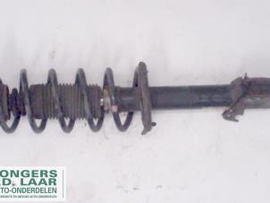 Used Fronts shock absorber, left Mitsubishi Colt Price on request offered by Bongers Auto-Onderdelen Zeeland