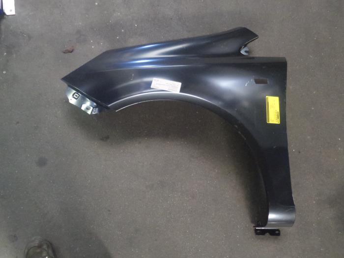 Front wing, left from a Opel Corsa 2008