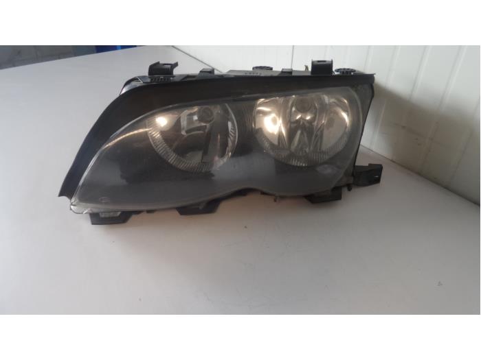 Headlight, left from a BMW 3 serie (E46/4) 318d 16V 2003
