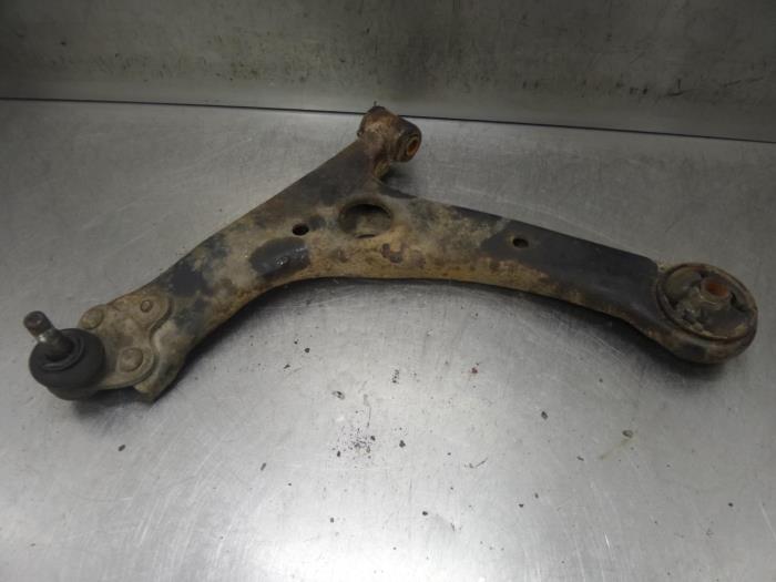 Front wishbone, left from a Toyota Corolla Verso 2003