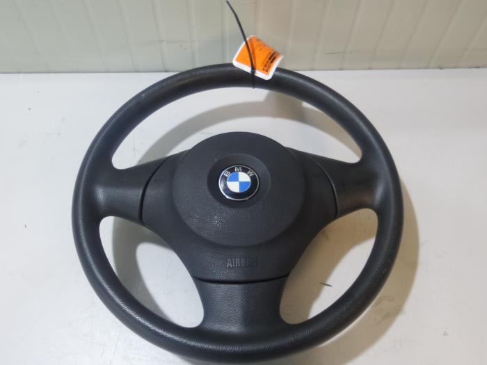 Left airbag (steering wheel) from a BMW 1 serie (E81) 118i 16V 2009