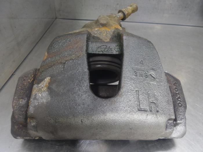 Front brake calliper, left from a Volvo V40 (MV) 1.6 D2 2013
