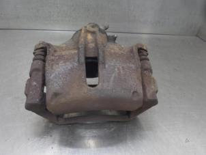 Used Front brake calliper, left Ford Mondeo Price on request offered by Bongers Auto-Onderdelen Zeeland