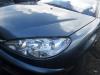Headlight, left from a Peugeot 206 2005
