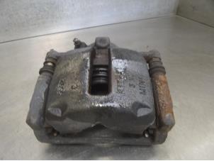 Used Front brake calliper, right Mini Mini Price on request offered by Bongers Auto-Onderdelen Zeeland