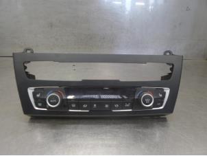 Usados Panel de control de calefacción BMW 1 serie (F20) 118d 2.0 16V Precio de solicitud ofrecido por Bongers Auto-Onderdelen Zeeland