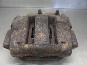 Used Front brake calliper, left Nissan Interstar Price on request offered by Bongers Auto-Onderdelen Zeeland