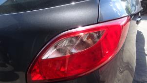 Used Taillight, right Mazda 2. Price on request offered by Bongers Auto-Onderdelen Zeeland