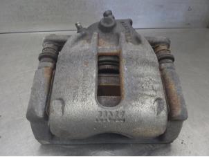 Used Front brake calliper, right Renault Clio III (BR/CR) 1.2 16V 75 Price on request offered by Bongers Auto-Onderdelen Zeeland