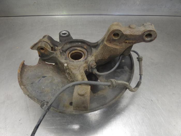 Knuckle, front right from a Mazda 2. 2010