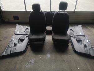 Used Set of upholstery (complete) Renault Clio Price on request offered by Bongers Auto-Onderdelen Zeeland