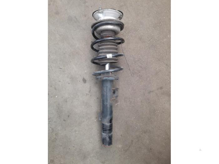 Front shock absorber rod, left from a BMW 1-Serie 2009