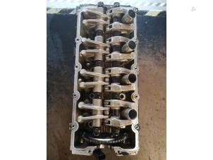 Used Cylinder head Mini ONE Price on request offered by Bongers Auto-Onderdelen Zeeland
