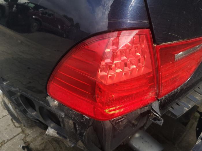 Taillight, left from a BMW 3 serie Touring (E91) 318d 16V 2009