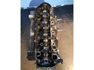 Used Cylinder head Renault Clio Price on request offered by Bongers Auto-Onderdelen Zeeland
