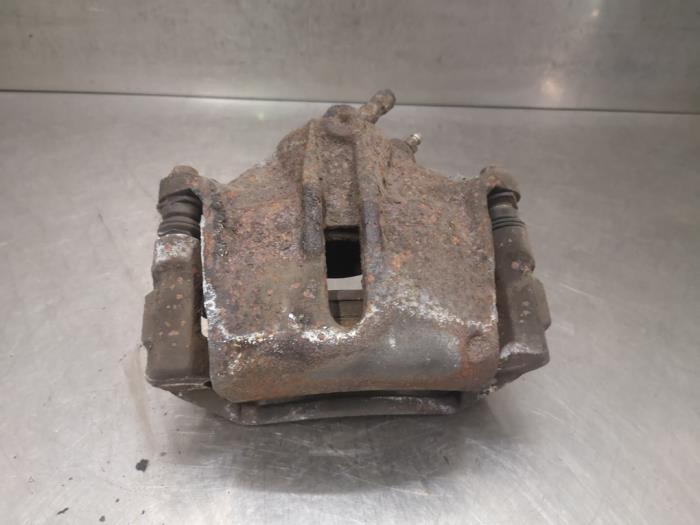 Front brake calliper, left from a Ford Mondeo III Wagon 2.2 TDCi 16V 2006