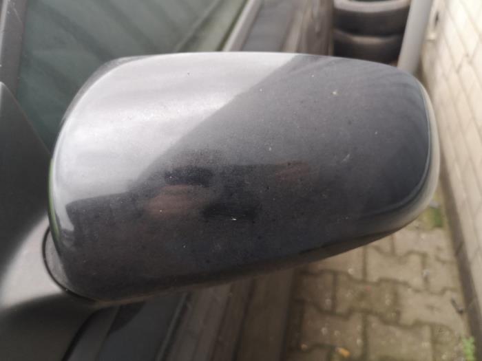 Wing mirror, left from a Audi A3 (8P1) 2.0 16V FSI 2004
