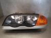 Headlight, left from a BMW 3 serie (E46/4) 316i 2000