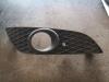 Fog light cover plate, right from a Opel Astra 2007