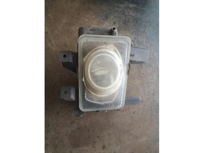 Fog light, front right from a Opel Astra 2007