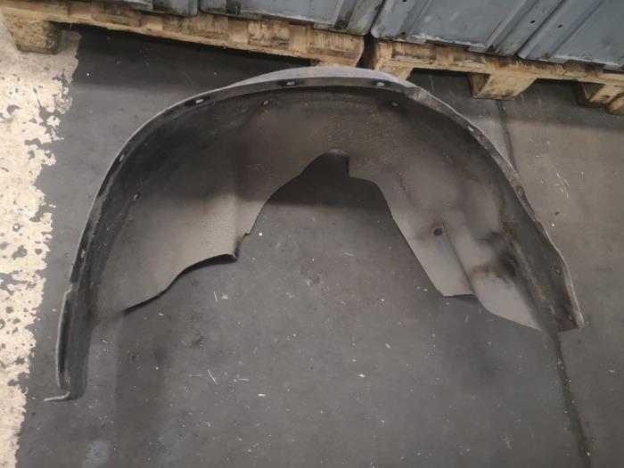 Wheel arch liner from a BMW X1 (E84) xDrive 18d 2.0 16V 2013