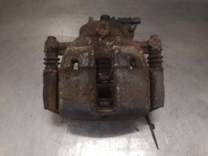 Used Front brake calliper, left Mitsubishi Colt Price on request offered by Bongers Auto-Onderdelen Zeeland
