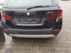 Pare-chocs arrière d'un BMW X1 (E84), 2009 / 2015 xDrive 18d 2.0 16V, SUV, Diesel, 1.995cc, 105kW (143pk), 4x4, N47D20C, 2009-10 / 2015-06, VP11; VP12; VP71; VP72 2010