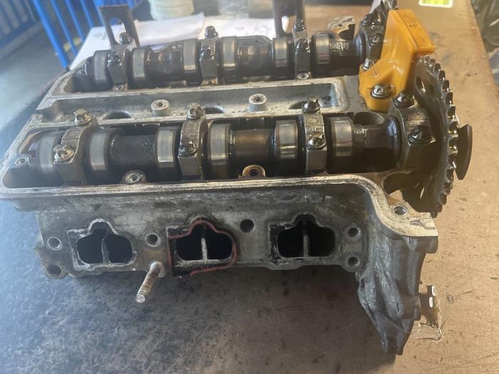 Cylinder head from a Opel Corsa D 1.0 2008