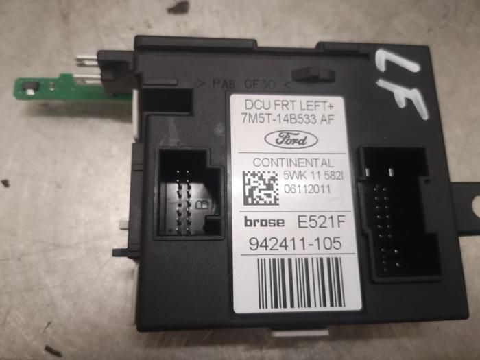 Central door locking module from a Ford Kuga I 2.0 TDCi 16V 140 4x4 2011