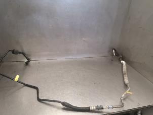 Used Power steering line Ford Mondeo Price on request offered by Bongers Auto-Onderdelen Zeeland