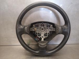 Used Steering wheel Peugeot 206+ (2L/M) 1.1 XR,XS Price on request offered by Bongers Auto-Onderdelen Zeeland